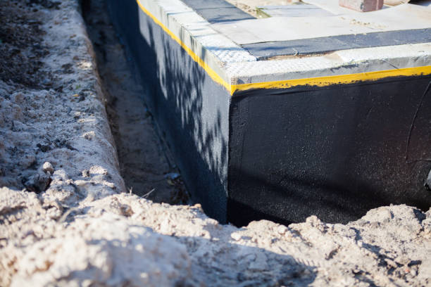 Professional Wet Basement Repair technician working in Roanoke, IN